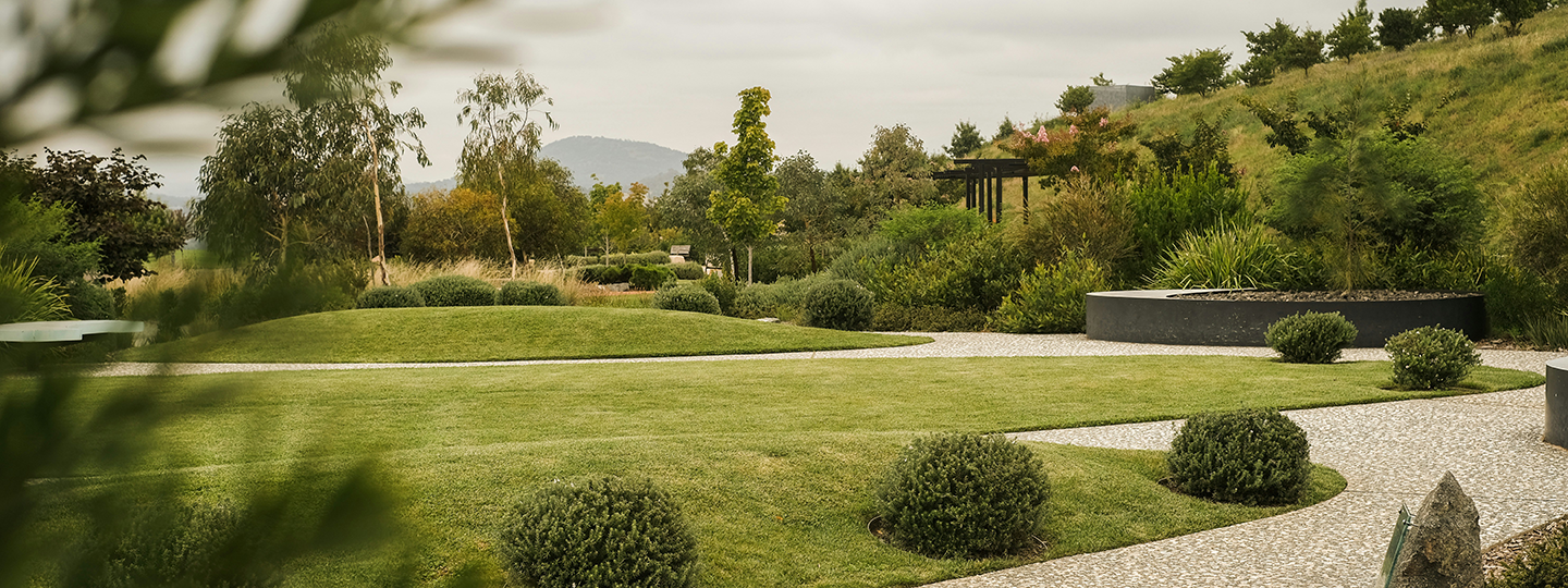 Perfectly manicured lawn and garden beds